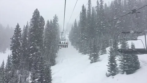 Slow Motion Snow Storm on Ski Lift at Telluride Colorado Stock Footage 74301558