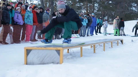 Slow motion: snowboarder jumping Stock Footage 52933500