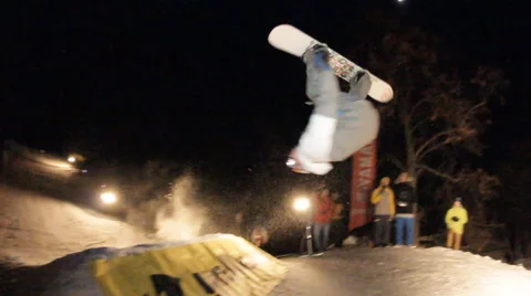 Slow motion: snowboarder jumping Stock Footage 52934018