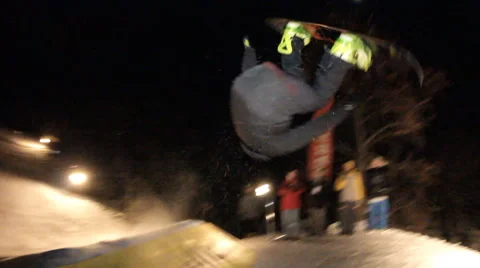 Slow motion: snowboarder jumping Stock Footage 52934830