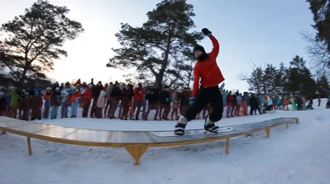 Slow motion: snowboarder jumping Stock Footage 52934969