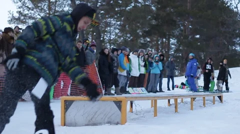 Slow motion: snowboarder jumping Stock Footage 52935463