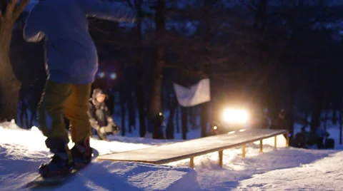 Slow motion: snowboarder jumping Stock Footage 52935938