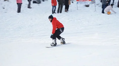 Slow motion: Snowboarder race Stock Footage 52935859
