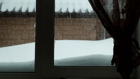 Slow motion of snowfall outside the window in the village. Stock-Footage 131277857