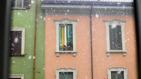 A slow-motion of Snowfall over the houses in Milan City. Stock Footage 144286252
