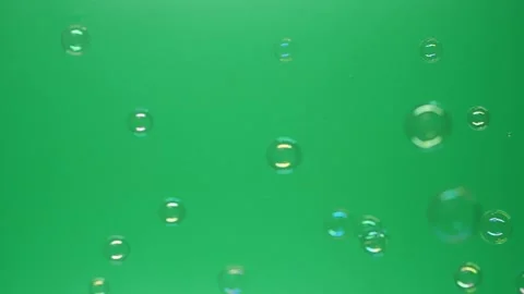Slow motion of soap air bubbles texture on chroma key green screen background Stock Footage 175641185