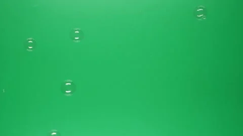 Slow motion of soap air bubbles texture on chroma key green screen background Видео 180868526