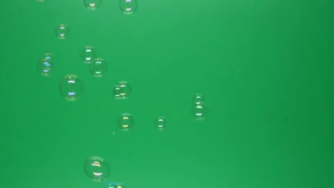 Slow motion of soap air bubbles texture on chroma key green screen background Stock Footage 189172977