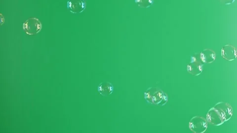 Slow motion of soap air bubbles texture on chroma key green screen background Stock Footage 196674179