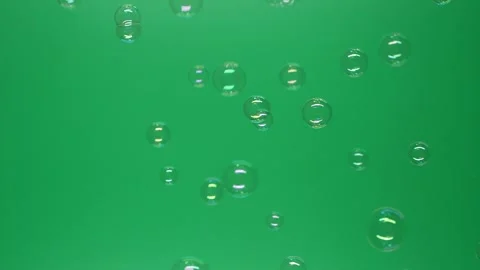 Slow motion of soap air bubbles texture on chroma key green screen background Видео 204493370