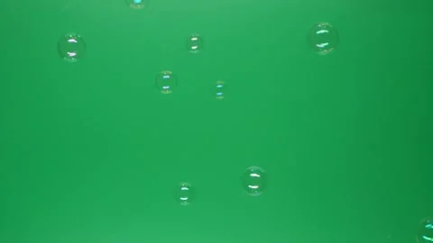 Slow motion of soap air bubbles texture on chroma key green screen background Stock Footage 205584790
