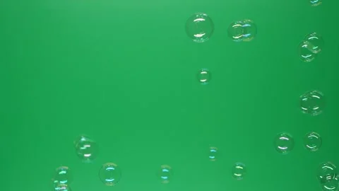 Slow motion of soap air bubbles texture on chroma key green screen background Vídeos de archivo 247684583