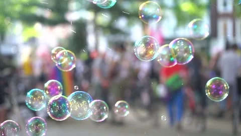 Slow motion of soap bubbles and flags for the 2019 Pride London, UK Stock Footage