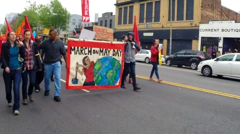Slow motion of Socialists marching through the streets Stock Footage 62790694