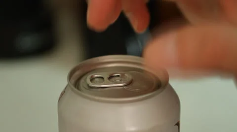 Slow motion soda can being opened by male hand Stock-Footage 22791346