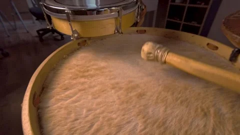 Slow Motion Soft Mallet Hits on Furry Drum Head of Traditional Bombo Leguero Stock Footage 340064149