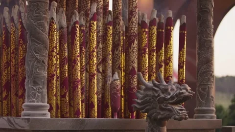 Slow motion softly lit interior of temple in Taiwan with glowing incense sticks  Stock Footage 313950511