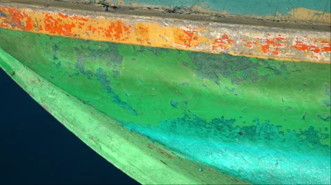Slow motion of solar flecks reflection from the water surface on old shabby boat Видео 57971485
