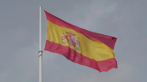 Slow motion of spanish flag waving with sky in background Stock Footage 266663395