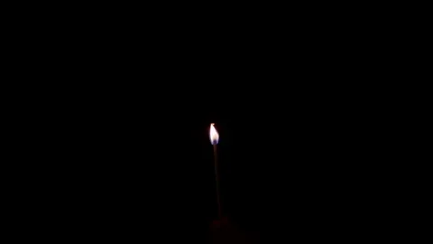 Slow motion sparkler being lit up by a matchstick Stock Footage 100204034
