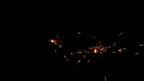 Slow motion sparkler lights explosion on black background, fireworks sparkling 스톡 동영상 150671563
