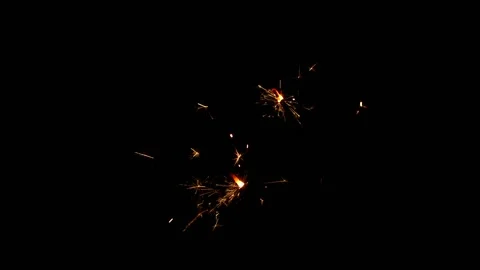 Slow motion of sparkler lights isolated on black background. Christmas design. Stock Footage 141678031