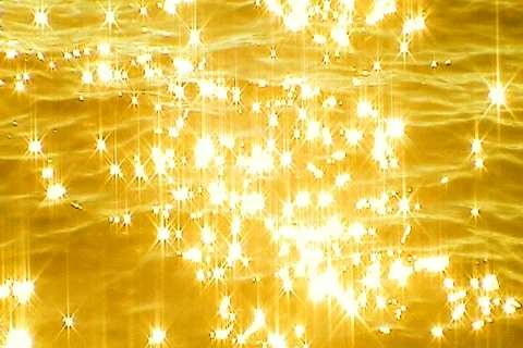 Slow motion sparkling water reflections - Gold Stock Footage