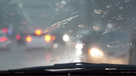 Slow motion speed blur scene vehicle light through windscreen Stock Footage 242274136