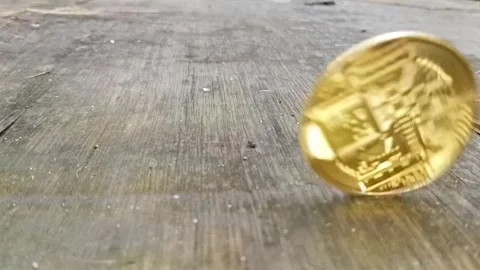 Slow motion spining coin Stock Footage 321509605
