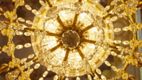 SLOW MOTION SPINING SHOT OF A CHANDELIER AT MADRID ROYAL PALACE Stock Footage 309495257