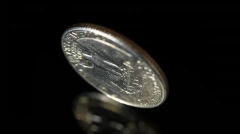 Slow motion spinning coin Stock Footage 43675154