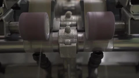Slow motion of a spinning mill machine with cotton threads passing through Stock Footage 257762020
