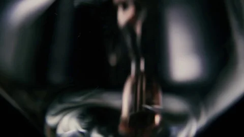 Slow motion. A splash of rose wine in a glass, close-up Stock-Footage 75154038