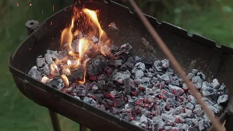 Slow motion split up fireplace for bbq. Burning wood in the fireplace close Stock Footage 95945751