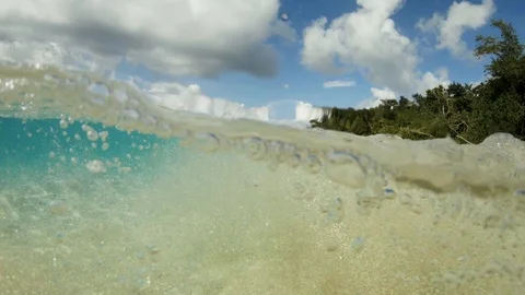 Slow motion split shot of rolling shoreline tropical beach Stock Footage 118776326