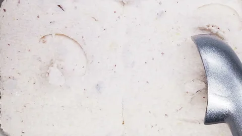 Slow motion of spoon taking chestnut and red bean ice cream Stock Footage 107507355