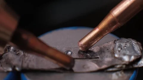 Slow Motion Spot Welding Battery Terminal with Smoke Macro Stock Footage 306678470