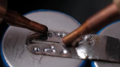 Slow Motion Spot Welding Lithium Battery Cells Macro Stock Footage 306215066