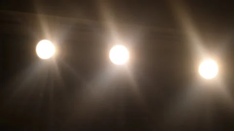 Slow motion of spotlights being turned on Stock Footage 132614206