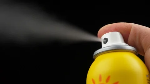 Slow motion of spray bottle drops on black background Stock Footage 109489406