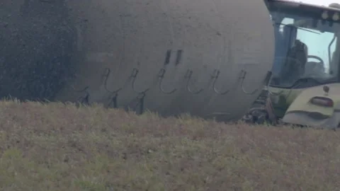 Slow motion of spreading slurry on a field, Germany Stock Footage 152848222