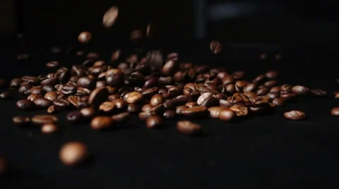 Slow motion sprinkle coffee beans Stock Footage 68633639