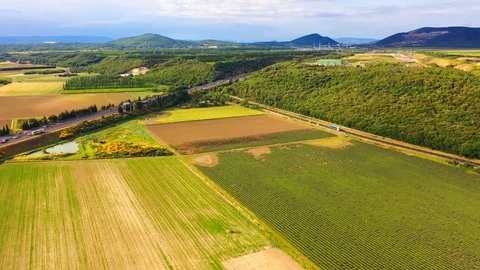 Slow motion stabilized shot - Famous cypress trees row along Tuscany road by POV Stock Footage 128765995
