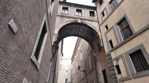 Slow Motion Stabilized Walk Under Ancient Stone Archway, Italy Vídeos de archivo 328845501