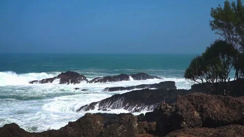 Slow motion of static shot rocky beach Stock Footage 251513645