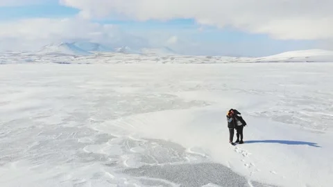 Slow motion static view mother and kid pose for selfie with white winter land Stock Footage 157918216