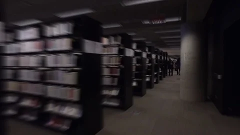 Slow Motion Steadicam Flow Through Library Stock Footage 71999397