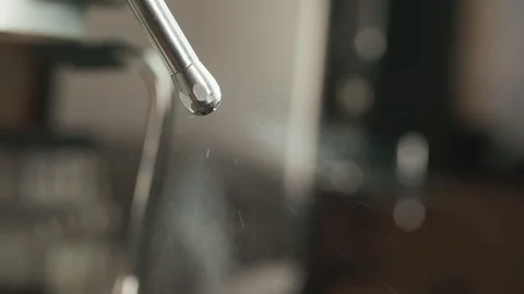 Slow motion of steam flow from coffee machine, extreme close up Video stock 88743202