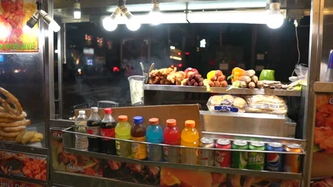 Slow Motion steam rolling off of food at food stand in New York City Stock Footage 248477316